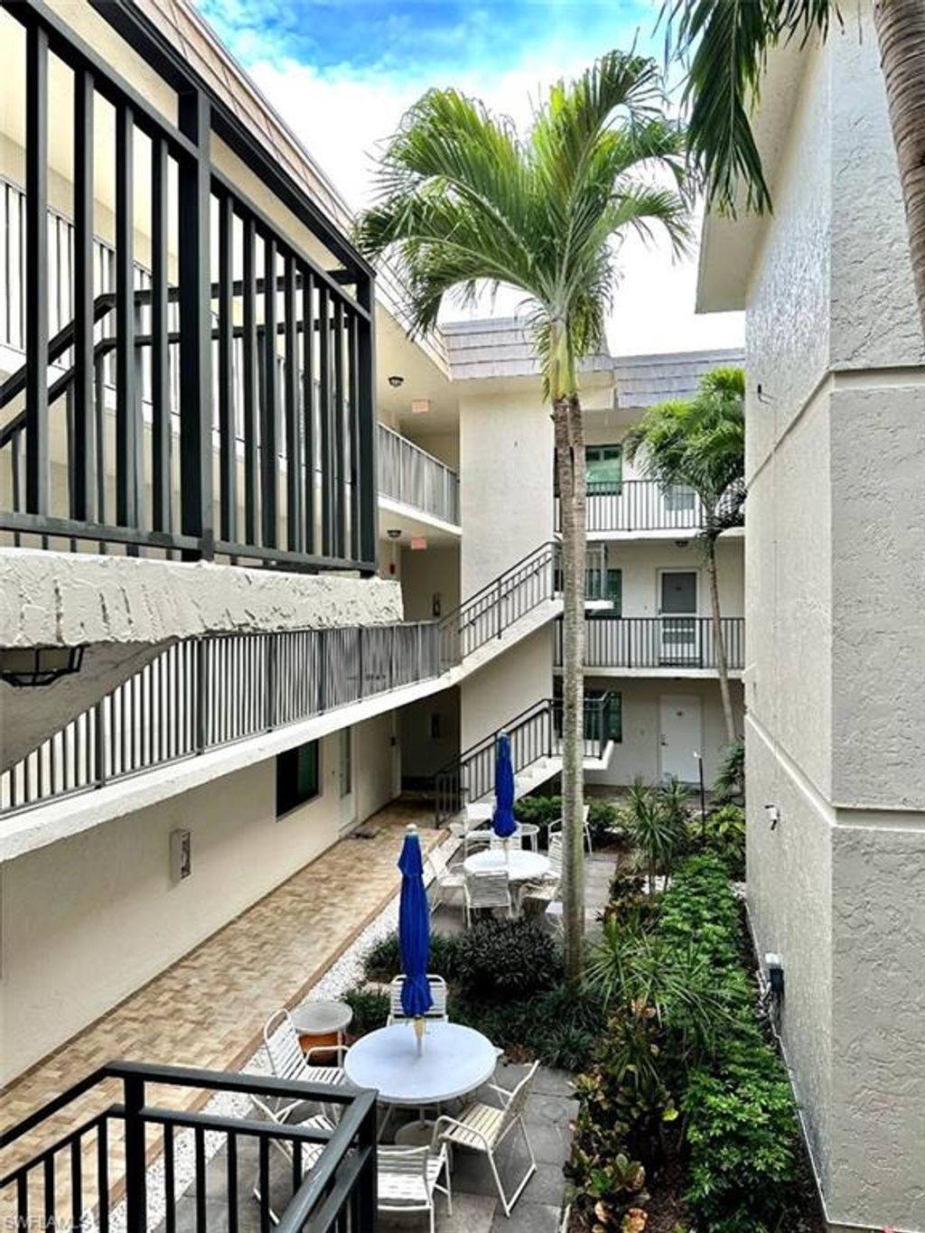 Photo of 788 Park Shore DR #A29, NAPLES, FL 34103 (MLS # 226011642)