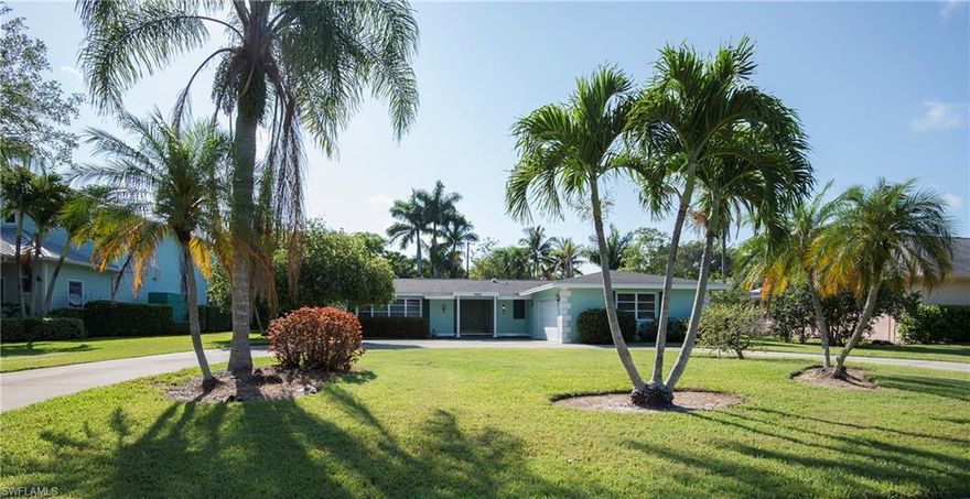 Centrally located in the heart of Naples, eight blocks to Lowdermilk Park, bicycling distance to Old Naples and the private beach park of the Moorings. This classic Florida home offers plenty of living and entertainment space, split bedrooms, three full baths, two car garage on an oversized lot with circular driveway. Thoughtfully updated in the late 1990's and lovingly maintained since.
