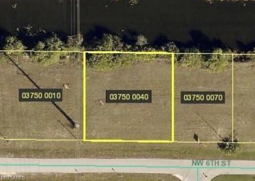 Build your dream home on this oversized .36-acre canal waterfront lot in Cape Coral! Enjoy beautiful water views and extra space for a pool, larger home, extra garages or outdoor living area. Conveniently located near restaurants, shopping, and everyday essentials. A great opportunity to own waterfront property in a fast-growing area.