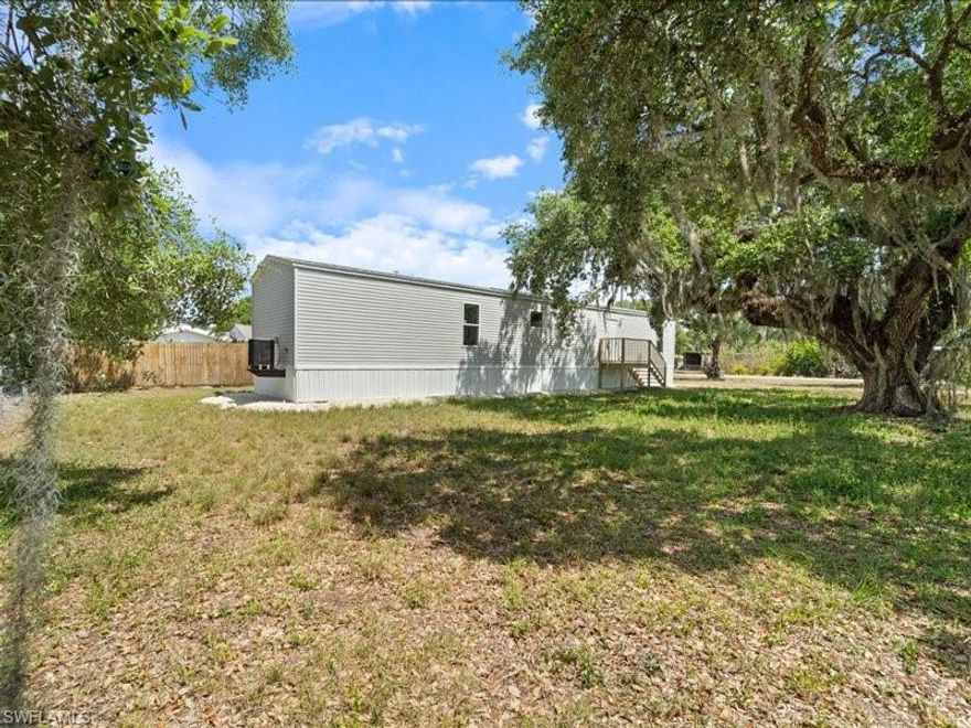 Discover waterfront living in Moore Haven! This Fairly New Manufactured 3-bedroom, 2-bath home sits on a spacious lot within walking distance to the Caloosahatchee River, enjoy fishing or relaxation. The spacious kitchen features gorgeous countertops and cabinetry, while the open-concept living and dining area is ideal for entertaining. The master suite has a spa-like bath and a huge walk-in closet. This move-in-ready home is priced to sell fast. Don’t miss out! Seller offering $5,000 toward buyers closing cost with asking price offer.