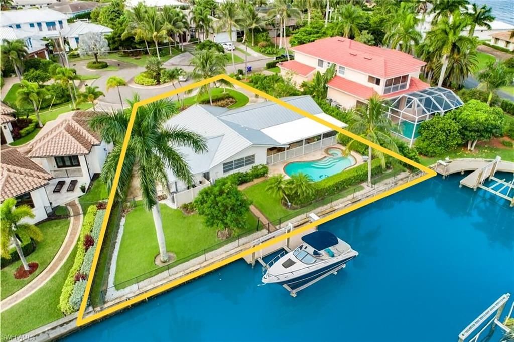 Photo of 1250 Tuna CT, NAPLES, FL 34102 (MLS # 225073898)