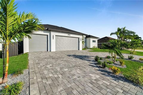 Photo of 3913 Agualinda BLVD, CAPE CORAL, FL 33914 (MLS # 2025018429)