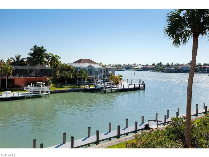 Resort style living at this completely updated and turnkey two bedroom, two bathroom unit in Eagle Cay. Direct access south end location with stunning water views. Open kitchen and living area, granite counters and tile throughout, high end stainless steel appliances, large custom walk in shower in master, dual sinks, custom closets and tropical style design and decor, upgraded mouldings and baseboard, LED lighting, plantation shutters, luxury full size large capacity Maytag washer and dryer in unit plus plenty of storage. Screened and spacious lanai with sparkling and tranquil views of bay, wide canal and boats passing by. Eagle Cay offers an array of amenities including common boat docks (lifts subject to lease availability), fishing station and pier, two pools, pavilion area, tennis/pickleball courts, car wash area, pet friendly, beautiful and expansive landscaped grounds, storage unit and one assigned covered parking space.