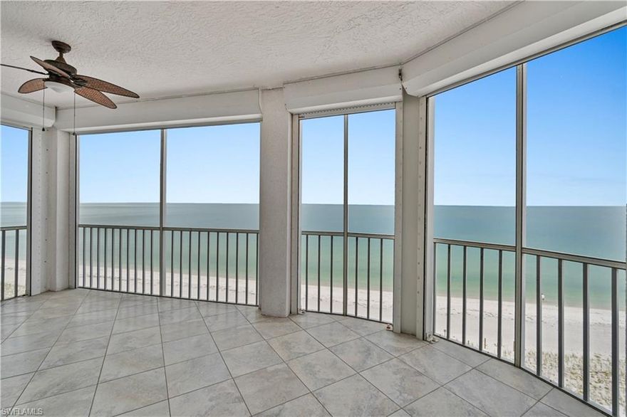 DIRECT BEACHFRONT, END-UNIT WITH 6TH FLOOR UNOBSTRUCTED GULF VIEWS in the coveted Barefoot Beach Club! Enjoy panoramic, front-row views of the Gulf from this beautifully maintained residence in North Naples’ premier coastal community. Bathed in extraordinary natural light courtesy of the extra windows available in a rare end-unit. With over 2,000 sq ft under air, this residence features 3 bedrooms, 3 bathrooms, tile flooring throughout, and electric hurricane shutters. The kitchen boasts white cabinetry, granite countertops, a built-in desk, and breathtaking views of both the Gulf and Bay. Step out to the wraparound screened lanai to take in endless sunsets, spot dolphins and manatees, and watch boats sail by. The primary suite offers private lanai access and a spacious en-suite bath with dual vanities, soaking tub, and a walk-in closet with custom built-ins. Nearby to the BRAND-NEW CLUBHOUSE with state-of-the-art fitness center & resort-style pool. Barefoot Beach residents enjoy 3 miles of beach, 2 pools/spas, manned/gated entry & on-site mgmt. OPTIONAL “Club at Barefoot” offers tennis, 2 restaurants & beachside food/bev/chair service. Excellent Collier County location minutes to Mercato, Waterside & easy access to RSW Airport.