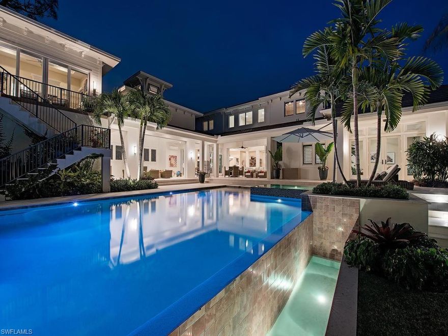 Location. Award winning architecture. Quality craftsmanship. Situated just steps to one of Naples’ pristine beaches and the renowned 3rd St. S. shopping/dining district. Designed by MHK Architecture & Planning this custom home is infused with their signature, classic old Florida attributes. Waterside Builders Inc. has again crafted a home that is above the bar offering peace of mind and long term value. Comfortable, open floor plan provides a feeling of space; a seamless transition from indoor to outdoor living areas. Massive, covered, climate controlled outdoor living area leads to the gracious pool/spa and the almost spa-like, expansive grounds unique in the marketplace. Large master suite offers a quiet office, his and her closets, gorgeous bath with walk-in shower and soaking tub. The home offers the Lutron system and the ability to control the lighting, ACs, pool/spa and 65 KW whole house generator remotely. Fantastic kitchen with Thermadore and Miele appliances as well as a prep-kitchen with additional gas range/oven and fridge. There’s a 600 bottle wine room as well. 3 garage bays with the ability for 3 lifts; 2 bays insulated and climate controlled. A fantastic opportunity.