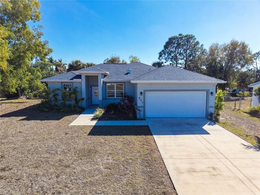 Built in 2023, this 3-bedroom residence with a den and 2 baths offers a refined take on modern waterfront living. Designed with tile flooring throughout and a light, open layout, the home is filled with natural light, enhanced by its desirable southern exposure. Enjoy Gulf access with only two bridges to the Caloosahatchee River, providing effortless boating and an exceptional coastal lifestyle. The living spaces extend seamlessly to an open patio, ideal for relaxing outdoors or entertaining in a serene setting. With contemporary construction, thoughtful design, and a bright, airy ambiance, this home delivers the perfect balance of elegance, comfort, and Florida waterfront living.