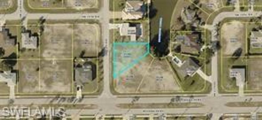 Freshwater canal front lot in highly desirable SW Cape with Seawall installed. 

Surrounded by beautiful homes in a nice quiet neighborhood. 

Great to build your new hole. Close to shops and restaurants. 

Buyer to assume balance of assessments.