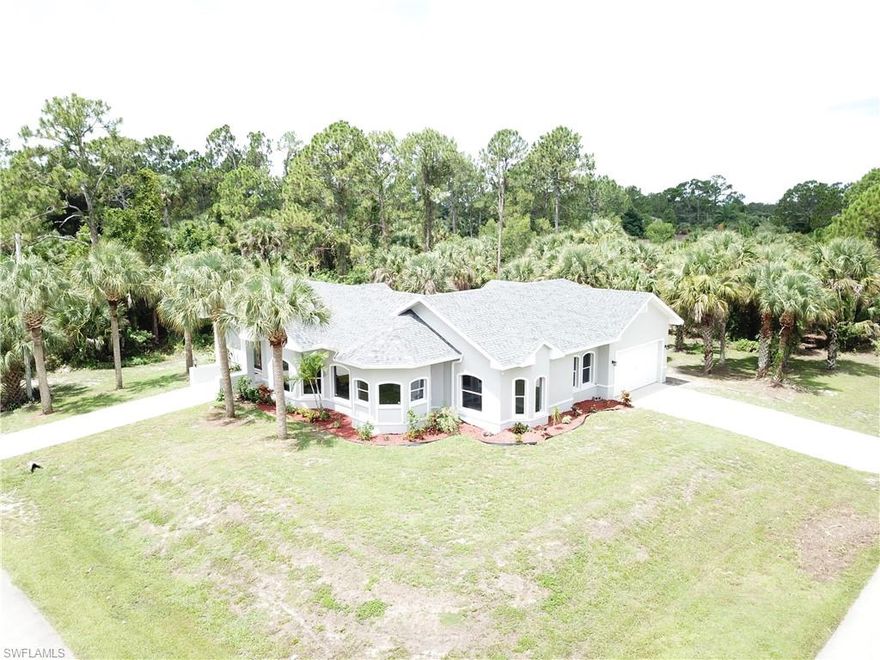 Multiple offer situation , highest and best offer due 7/1/2021 7pm. Wow, look at this stunning renovated property. This is one of the kind properties surrounded by mature palm trees on a half acres lot.  Brand new roof and high end water heater are the icing on the cake. Corner lot provides unique curb appeal with double driveway, which fits many vehicles and toys. Walking up to a grand entrance and step into this large home, totally redone tile floor and high baseboard provide modern feel to it. kitchen provides great cabinets going up all the way to the ceiling provides lots of storage. Stainless steel appliances and high-level granite countertop as well as glass backsplash are the nice touches to the kitchen. Huge square living room provides enough useable space for family gathering. Each bedrooms have large walk-in closet. Extra high ceiling throughout entire house added that extra large feel. Extra high ceiling in the garage provides ample space. Nice paved backdoor area and huge backyard provides endless possibilities for nice Florida outdoor living style. Hurry up and come to see this property before it is too late.