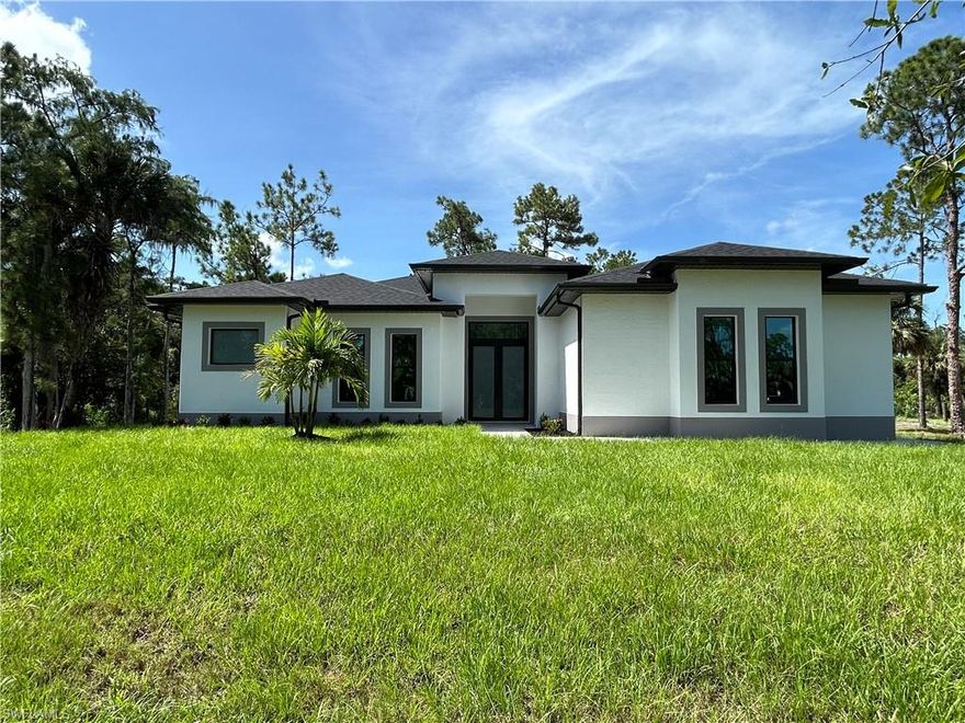 NEW CONSTRUCTION......BEAUTIFULL 3 BEDROOMS, 2 BATH AND 2 CAR GARAGE SITS ON 2.73  ACRES FENCE LOT WITH ELECTRIC GATE .......THIS BRAND NEW HOME ALSO FEATURES A BRIGHT & OPEN FORMAL LIVING & DINING ROOM,IMPACT WINDOW,GRANITE COUNTER TOPS, STAINLESS STEEL APPLIANCES, TILE FLOOR WITH SPLIT BEDROOM, WALK-IN CLOSET IN MASTER BEDROOM, TRAY CEILING, AUTOMATIC IRRIGATION SYSTEM , ASPHALT DRIVEWAY AND MORE....BRING YOUR FAMILY AND YOUR PETS AND MAKE THIS HOME AN AWESOME PLACE TO LIVE . VERY PRIVATE AND CONVENIENTLY LOCATED NEAR SCHOOLS AND SHOPPING CENTERS.HOUSE IS READY TO MOVE.