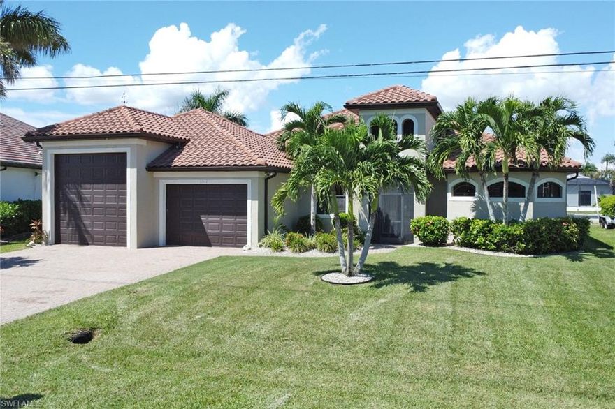 Experience the true Southwest Florida lifestyle in this stunning 3-bedroom, 2-bath Gulf Access home perfectly situated near an intersecting canal with phenomenal views! Cape Coral is known for its 417+ miles of navigable canals, and this property takes full advantage. From your new dock and boat lift, you’re just about 40 minutes to the Gulf of America, where island-hopping adventures awaits from Cabbage Key to Sanibel, Captiva, Cay Costa, and as far as Gasparilla if you're up for it! Enjoy fishing, dolphin watching, or a sunset cruise to your favorite waterside restaurants here in Cape Coral.
Inside, the home showcases new tile flooring throughout, granite countertops, a spacious two-car garage plus an oversized RV garage, and a paver driveway leading to a screened-in front entry. The large master suite is a retreat with its soaking tub, walk-in shower, and dual walk-in closets. Recent updates include a upgraded appliances, hot water heater, and all new tile flooring, giving you peace of mind.
Step outside to your sparkling pool and lanai area, the perfect place to soak in the breathtaking water views. Restaurants and shopping are all within walking distance as well, which means convenience meets coastal living, weather it be by foot, car or boat...this is the one!
Cape Coral’s beauty is unmatched, and from this address you’ll have front-row seats to it all—whether it’s boating, dining, fishing, shopping, or exploring nearby downtown Fort Myers. This home truly blends elegance, comfort, and location for the ultimate Florida lifestyle, call today for a tour!