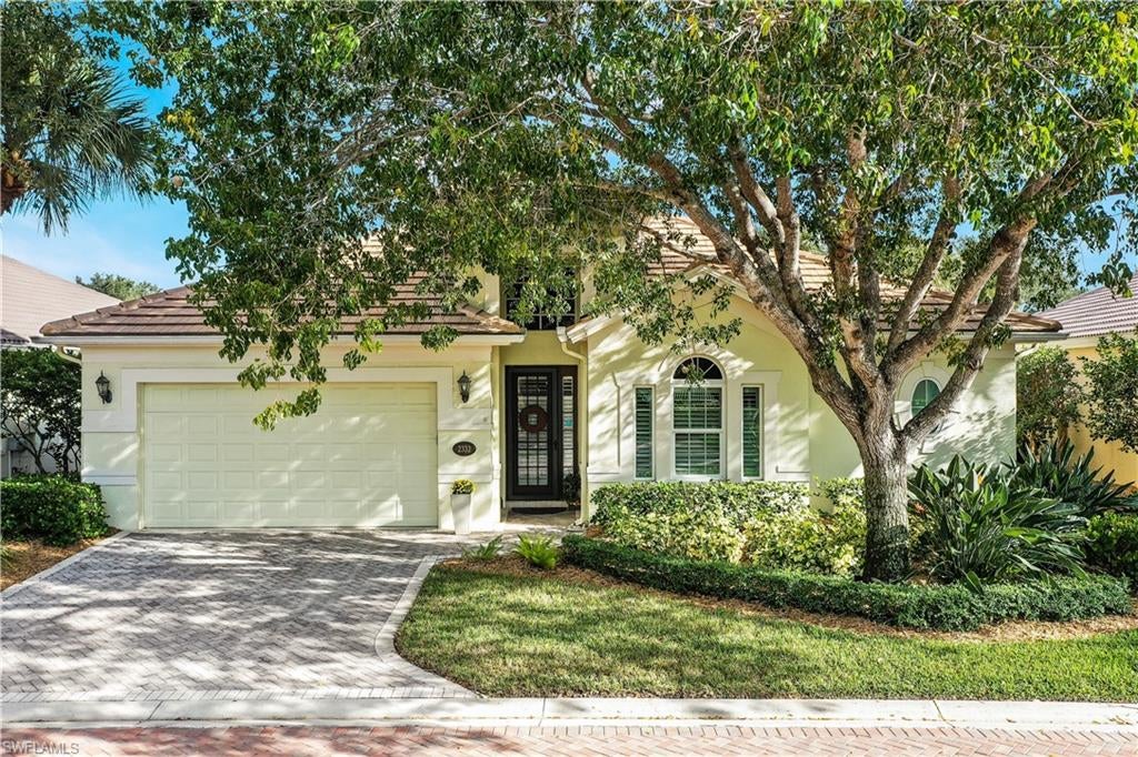 Photo of 2332 Island Cove CIR, NAPLES, FL 34109 (MLS # 223085442)