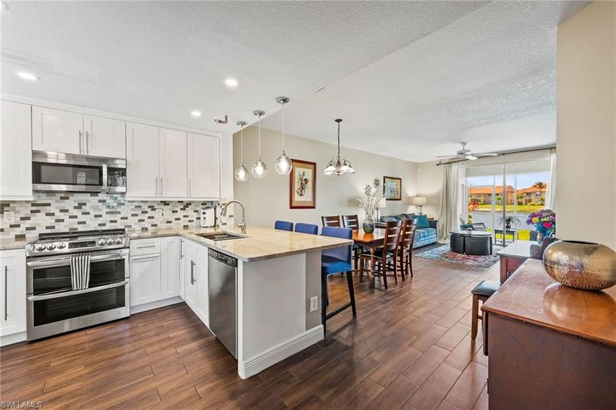 Beautiful, fully renovated, lakeside condo in desirable North Naples community of Huntington Lakes.  Open floor plan.  Kitchen with new cabinets, quartz countertops, stainless appliances, recessed and pendant lighting, coffee bar, 3 years new.  Completely remodeled bathrooms including sinks and vanities, lighting, shower tile, floor tile.
New tile flooring throughout.  New roof in 2022.  New AC in 2022.  New electrical panel 2023.  New appliances 2020.  Ducts cleaned.  North facing lanai to be enjoyed any time of day and year round.  Six miles to the Gulf.  20 minutes to Olde Naples.  20 minutes to RSW.  Shopping, dining, and entertainment nearby.  You will love it here!