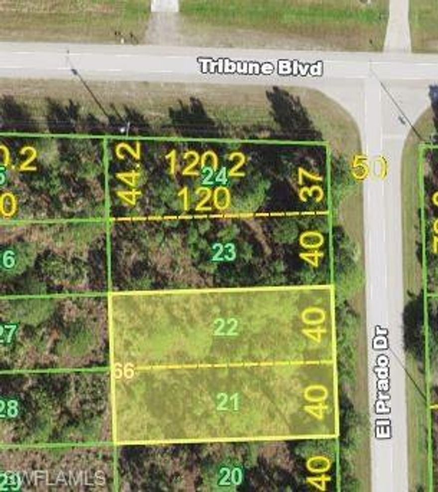 Very nice double lot.  Double lot on paved rd in fast growing area