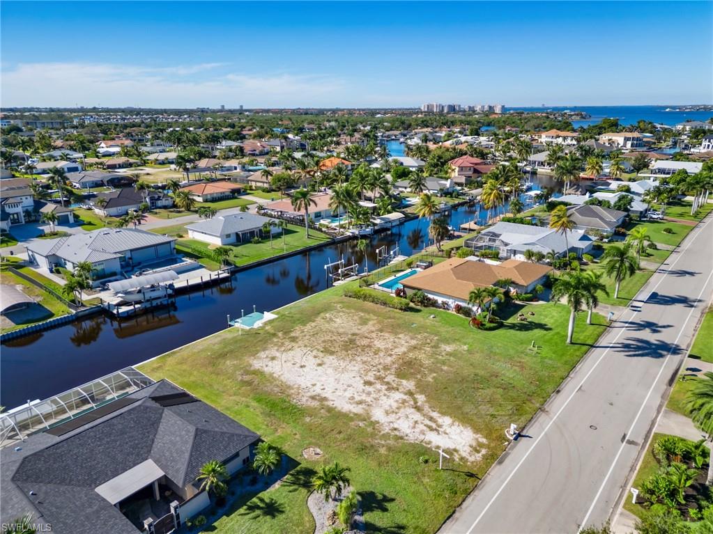 TOWN AND RIVER - Land