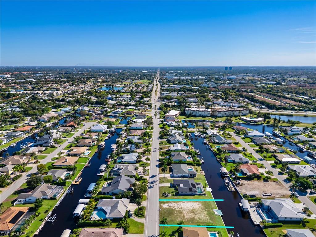 TOWN AND RIVER - Land