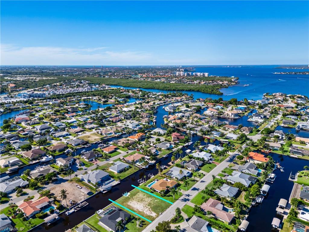 TOWN AND RIVER - Land