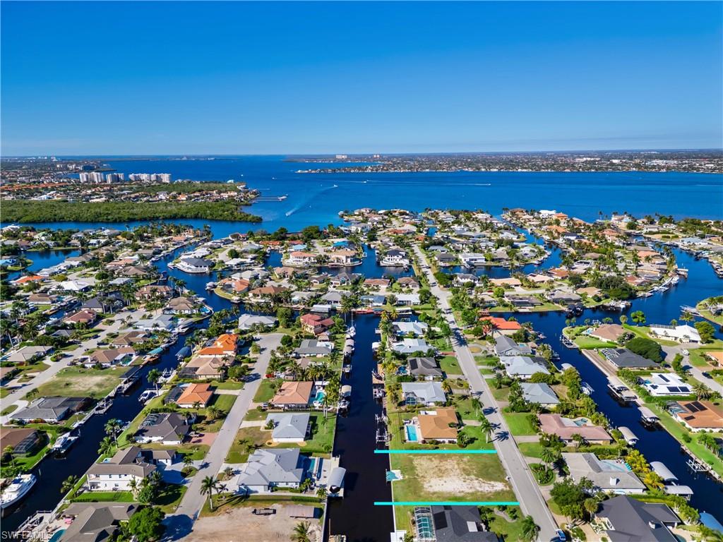 TOWN AND RIVER - Land