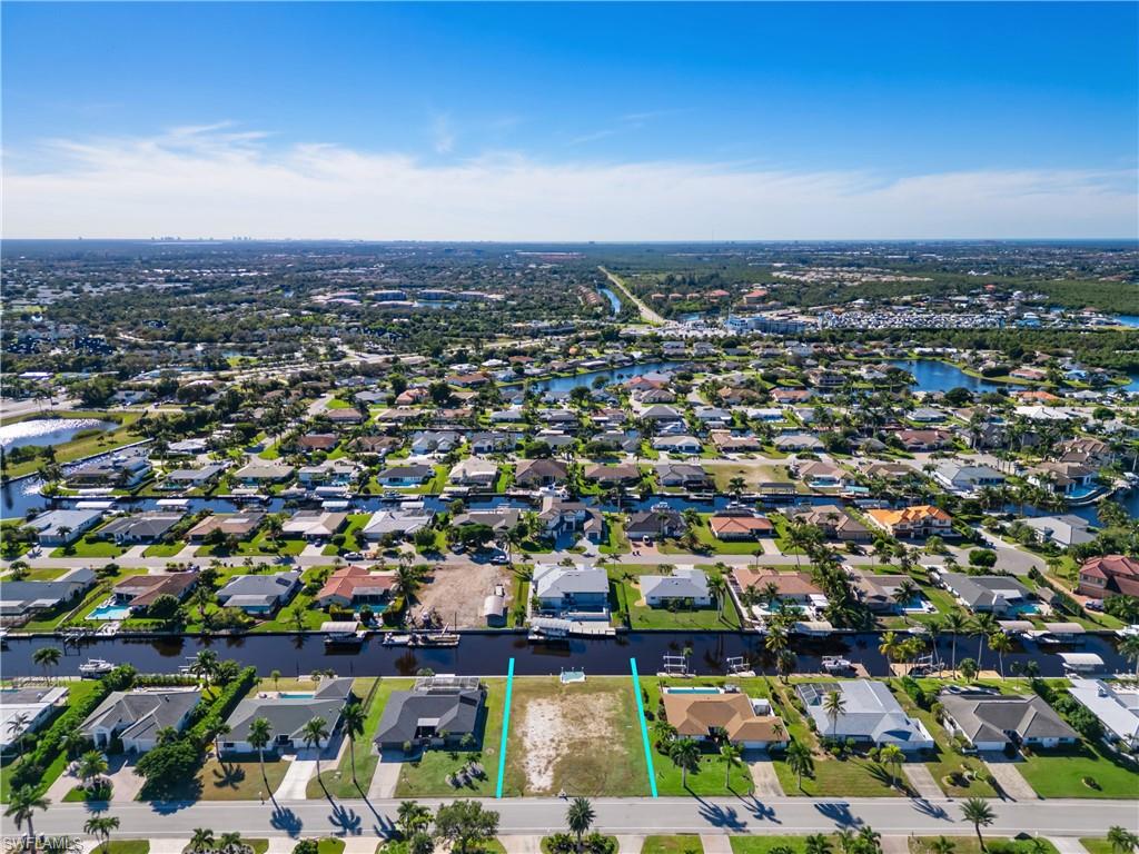 TOWN AND RIVER - Land