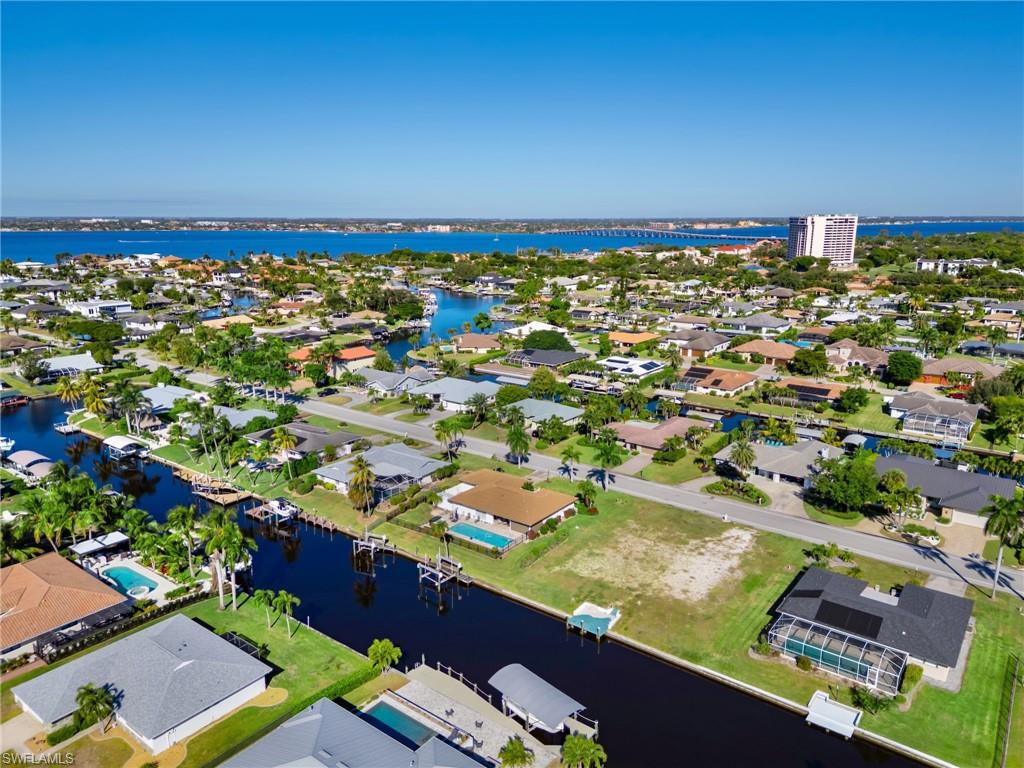 TOWN AND RIVER - Land