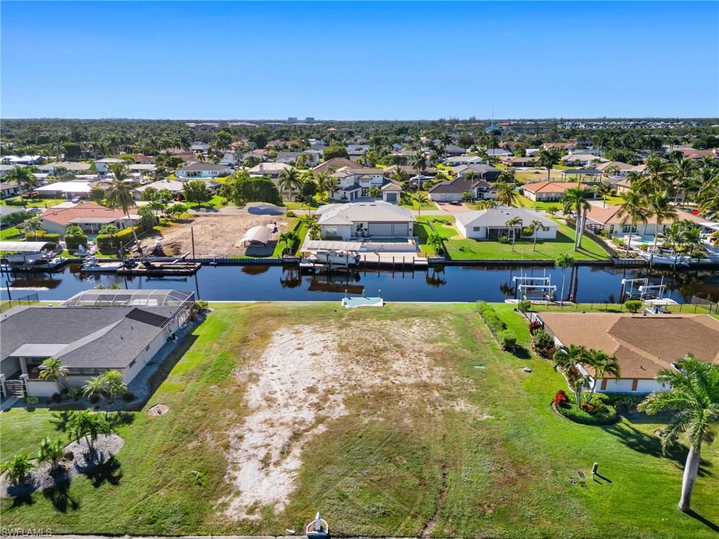 TOWN AND RIVER - Land