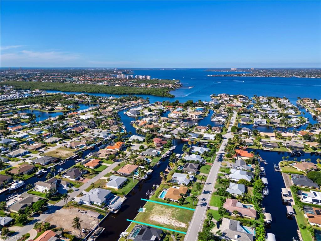 TOWN AND RIVER - Land