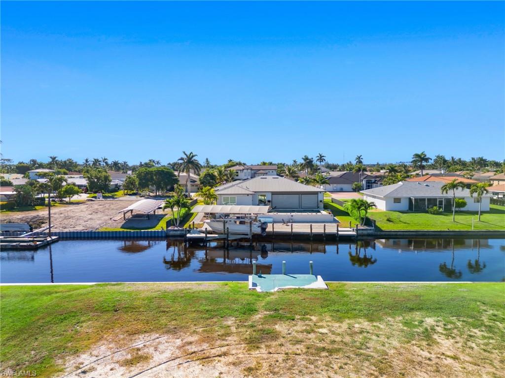 TOWN AND RIVER - Land