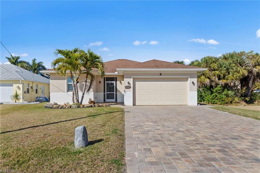 We offer a custom design built home on a waterfront-gulf access lot with seawall, all constructed in 2017 to an elevation of 7.5. Located on Marquette Blvd on a quiet dead end street and one of the best locations in Fort Myers Shores. The home offers insulated Impact windows & doors and the lanai is protected with motor operated roll down hurricane screen shutters. The property is nicely landscaped with paver drive, walks and patios. Garage floor is epoxy coated and the home is pre-wired from outside to electric panel for portable generator service. There is a paver patio by the water with a gas fire pit and a patio off the lanai for grilling and outside seating. The home floor plan was designed for Florida living with an open concept that flows from the kitchen & dining nook to family room which opens to the lanai. The bedroom wing offers a master suite with door to lanai, walk in closet and a bath large shower and garden tub. there are two guest bedrooms that share a full bath between them.  The home sells partially furnished