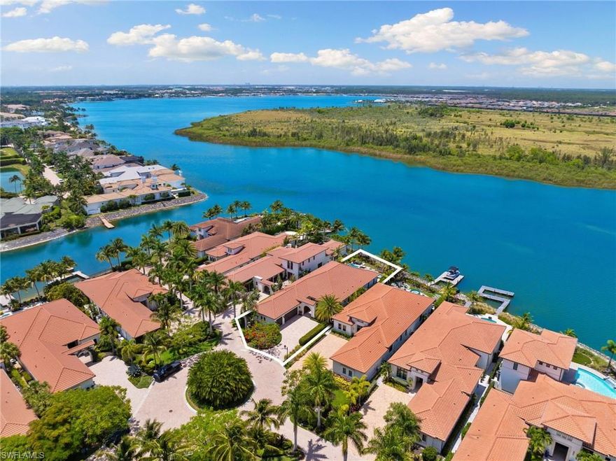 Luxury and charm are combined with world-class craftsmanship to deliver this showcase London Bay previous model home in the exclusive Portofino at Miromar Lakes Beach & Golf Club. Situated on a premium waterfront lot with unobstructed views of Lake Como and a serene natural preserve. The Benita floor plan, best known for its open living concept, features four bedrooms, four bathrooms, an expansive outdoor area and a 3-car garage. The gourmet-inspired kitchen features upgraded cabinetry and paneled Sub Zero appliances, Wolf natural gas range, built-in wine cooler, stained wood-plank ceiling, walk-in pantry and more. Designer upgrades and furnishings throughout by award-winning Romanza Interior Design that include custom window treatments and plantation shutters, designer wallpaper, upgraded sconces and lighting, upgraded crown and wall moldings, outdoor bug mist system, built-in interior and exterior speakers, smart light switches and Control4 home automation system. The elegant master suite offers two walk-in closets, custom bathroom vanities and mirrors, water closet and freestanding tub. Sliding 10' glass doors in the great room and kitchen leads to the outdoor living area that includes an outdoor kitchen, motorized retractable screens, natural gas fire pit area and travertine pavers. The dramatic custom pool and spa, flanked by four palm trees, boasts a large sun shelf and waterfall. Miromar Lakes offers it all – from a 700-acre freshwater lake to three miles of private white-sand beach. Add in a wellness spa and state-of-the-art fitness center, seven Har-Tru tennis courts, and a 10,000-square-foot zero-edge infinity pool and the only Arthur Hills-designed “Signature” championship golf course in Southwest Florida. The Marina, a popular venue for fitness classes and social events, features a parterre garden, bocce courts, fitness stations, boat slips and pavilions for entertaining. It also provides water taxi shuttle service to the community’s Beach Club, which offers gourmet dining, a library, billiard room, card room, 50-seat theater and business center.