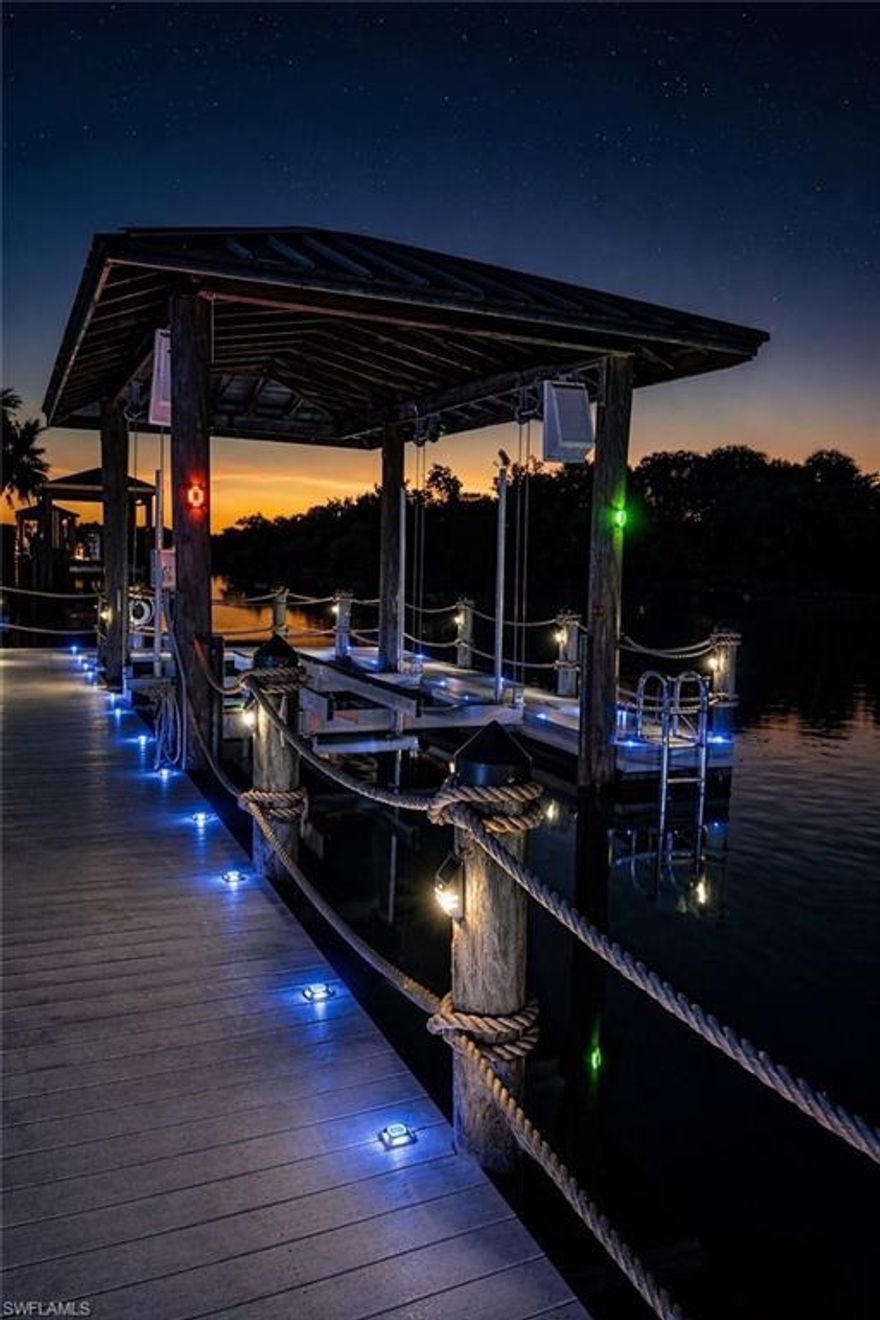 This is not a renovation—it's a completely rebuilt waterfront home, turnkey furnished, offering deep water access just steps from open water. Without the risk, wait, or uncertainty of new construction!
Every major system has been replaced and upgraded for long-term performance. 
A Gulf Access residence where structure, systems, and design converge—delivering enduring performance, refined luxury, and a level of confidence rarely found in this market.
Completely rebuilt and never lived in, this home offers the quality of modern construction in an area where most properties reflect original or partially updated systems. Major upgrades include all-new plumbing and electrical systems, new stucco and lath, new attic insulation, waterproofed garage and lanai walls, and an insulated, impact-rated garage door—addressing structural and moisture vulnerabilities that are typically left unresolved. 
Offered furnished, the home allows for an immediate lifestyle transition—step in and begin enjoying Florida waterfront living from day one. The interior blends custom craftsmanship with modern functionality and a quietly elevated level of finish throughout. Features include custom carpentry, Silestone countertops with Hybriq+ technology, Samsung Bespoke appliances, spa-like baths with wood ceilings and full tilework, and California Closets throughout. Oversized windows and solar tubes enhance natural light, creating an open, refined living environment.
Built for coastal conditions with PGT impact windows and doors and a hurricane-rated Coastal Max roof (both with assignable lifetime warranties). Additional features include a Rheem 3.5-ton HVAC system with HALO air purification, a KIND whole-home water system, integrated smart home technology, Sonos audio, Starlink internet, and AI-driven security.
The rebuilt and expanded dock accommodates vessels up to 36 ft and 15,000 lbs, with new electrical and plumbing systems and a dedicated jet ski lift. Deep-water access the approximate 300 yards to Charlotte Harbor provides exceptional boating convenience. New landscaping completes the exterior.
Turnkey, fully rebuilt, and engineered for long-term performance—offering immediate enjoyment and a level of quality that sets it apart from anything comparable. 
Skip the build. Own the result. Everything that scares buyers about Florida Real estate has already been mitigated. Recently repositioned to accelerate sale. Come experience coastal luxury today!