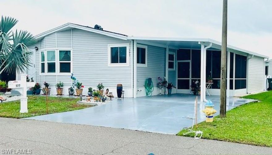 Discover your dream home at 577 Portside Dr., North Port, FL, nestled in the vibrant, pet-friendly, 55+ Harbor Isles community! VA LOAN IS ASSUMABLE AT JUST 3.5%. (OPEN TO NON-VETERANS). Financing available and Flood Insurance is transferable. No need to wait, this home is ready for you to move right into the best resort style community in all of Sarasota County. Manurfactured Home Financing Available/Application and Information included in documents. This move-in-ready, 2-bedroom, 2-bath manufactured home on owned land is a true gem, untouched by Hurricanes Debbie, Helena, or Milton. Built for durability, it features impact-resistant windows and doors, multiple tie-downs with stabilization on all corners of the crawlspace (meeting all stabilization codes), and a code-compliant carport with added four-rail support for peace of mind. Step inside to an open-concept living space with bamboo flooring flowing through the main living area, kitchen, and primary bedroom. The spacious living room is bathed in natural light, perfect for relaxing or entertaining guests. Adjacent, a versatile den/office space offers flexibility for your personal needs. The modern kitchen boasts ample cabinetry and a convenient layout, ideal for home chefs. The primary bedroom features bamboo flooring, an en-suite bathroom with new shower doors, dual sinks, and stylish tile flooring. Recent updates elevate this home’s appeal: re-piped in 2023, new gutters and drain spouts, a 2024 AC unit, Aero Seal thoughout the entire vent system, 4th rail structure for safety and durability and a 2025 30 GALLON STATE hot water heater with expansion tank ensure top-notch condition. Additional upgrades are detailed in available documentation. Outside, embrace Florida living with a screened lanai for year-round comfort and an open patio for soaking up the sun. A large storage room adds convenience. Most furniture stays, making your move seamless. Harbor Isles enhances your lifestyle with resort-style amenities, including a marina with direct Myakka River access, boat slips, a kayak/canoe launch, a fishing dock with cleaning station, and a scenic pavilion. Enjoy a temperature-controlled pool with Jacuzzi, a fully equipped fitness center with showers and sauna, tennis and pickleball courts, shuffleboard, bocce courts, horseshoe pits, and a golf practice net. The 24-hour gated community also offers a clubhouse, library, billiards room, and a variety of organized activities for an active, social lifestyle. Located near Venice Beaches, shopping, dining, and golfing, Harbor Isles is perfectly positioned for convenience and leisure. Schedule a tour today to experience this turnkey treasure in a premier waterfront community!