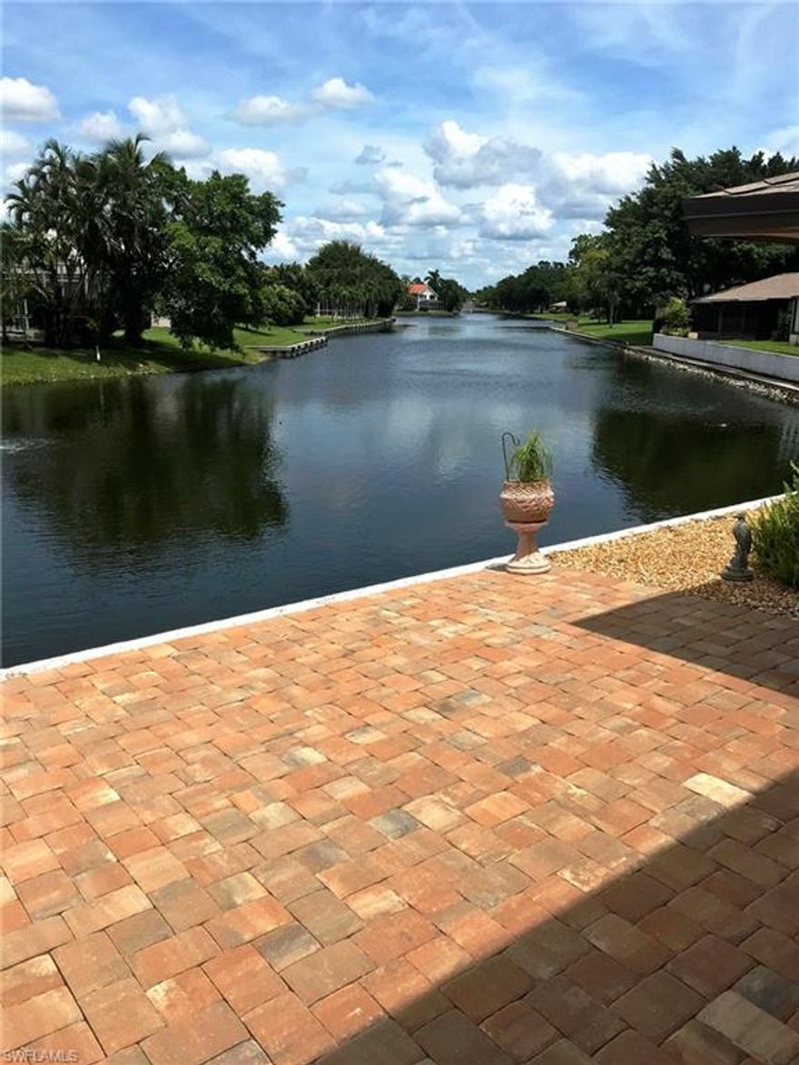 Super nice WATERFRONT 2-story villa. Gorgeous views from your newly pavered outdoor patio...RIGHT on the water.   Features include:  NEW roof in 2018, NEW vinyl courtyard privacy fence in 2019, master jetted soaking tub with inline heat, 2018 new AC/furnace and all new duct work, porcelain tile throughout downstairs, handicap height toilets, front and back pavers.  It a secluded neighborhood.  on a county road.  Community boasts 3rd largest heated pool in Lee County, tennis, pickleball, bocci, gym with men's/women's dressing area, billiards room, community room.  This is an ACTIVE community come season with activities planned via the social committee.  Great place to live and so close to everything.  This is a cash only purchase; agents please see confidential remarks.