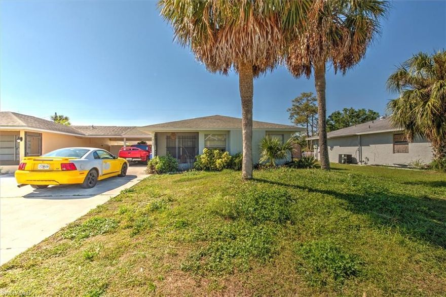 Darling 2 bed/ 2 bath home with attached carport. Home features a screed front porch on the front and a large screened florida room off the back. Partially fenced. Roof 2006. Great room floorplan with large living room and kitchen with dining nook and bay windows. 2 bed rooms - both with ensuite bathrooms. Tiled / laminate flooring throughout. Propane gas range! Investors - current renters have occupied for 12 years and would be interested in staying. Central Water and Sewer. Convenient to Fort Myers International airport, close to shopping and dining and 30 miles to Fort Myers Beach.