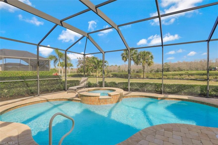 GORGEOUS, GOLF AND PRESERVE VIEW!  This PRISTINE 2 bedroom, 2 bath, plus den/home office or 3rd bedroom home sits on an oversize lot and has a stunning view of the 7th fairway and peaceful preserve. Fine appointments include an updated kitchen with quartz countertops, white cabinets, stainless steel appliances, plantation shutters, diagonal tile throughout with hardwood floors in den, closet system in master bedroom, and epoxy painted garage floor.  The spacious lanai features a heated pool with hot tub and Storm Smart Shutter. LIVE A VACATION LIFESTYLE IN A COUNTRY CLUB SETTING! The Quarry is a gated lakefront community offering 500 plus acres of lakes for boating, skiing, paddle boarding, jet skiing, and fishing. Additional amenities include Tennis, Pickleball, Bocce Ball, a Tiki Bar, Restaurants, Pool-side food/drink Service, Fitness Center and a full-time Activities Director. The Golf Lodge & Golf Club offers an 18 hole PGA Level Hurdzan Frye Golf Course and its own private clubhouse & restaurant (Membership Optional.)