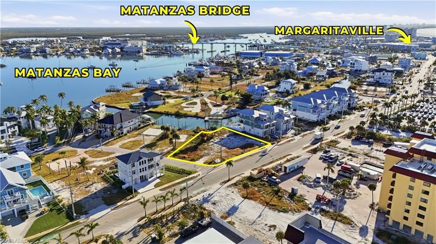 RARE .40-acre (17,293 sq ft) Gulf Access Canal buildable lot. $300,000 ++ Gross Income Potential. BAY Views &                                     directly ACROSS FROM THE BEACH. Zoned and positioned for a 3-story LUXURY Single family, Duplex or Triplex.  Unlimited SUNSETS plus quick Boating access to the Gulf and the Pier District waterfront dining scene. Rare opportunity to build your Dream home in one of the most sought-after areas of Fort Myers Beach — just north of Times square / Pier District. This oversized homesite presents exceptional high-performance short-term rental potential given its walkable access to Times Square, Margaritaville, beaches, restaurants, and entertainment. Beach access, boating access, and income potential all in one location. Enjoy daily walks on the beach, breathtaking sunsets, and the ultimate convenience of beach and boating access in one of the island’s most desirable and walkable locations. A rare homesite and investment opportunity in the heart of Fort Myers Beach. Multiple builder introductions available.