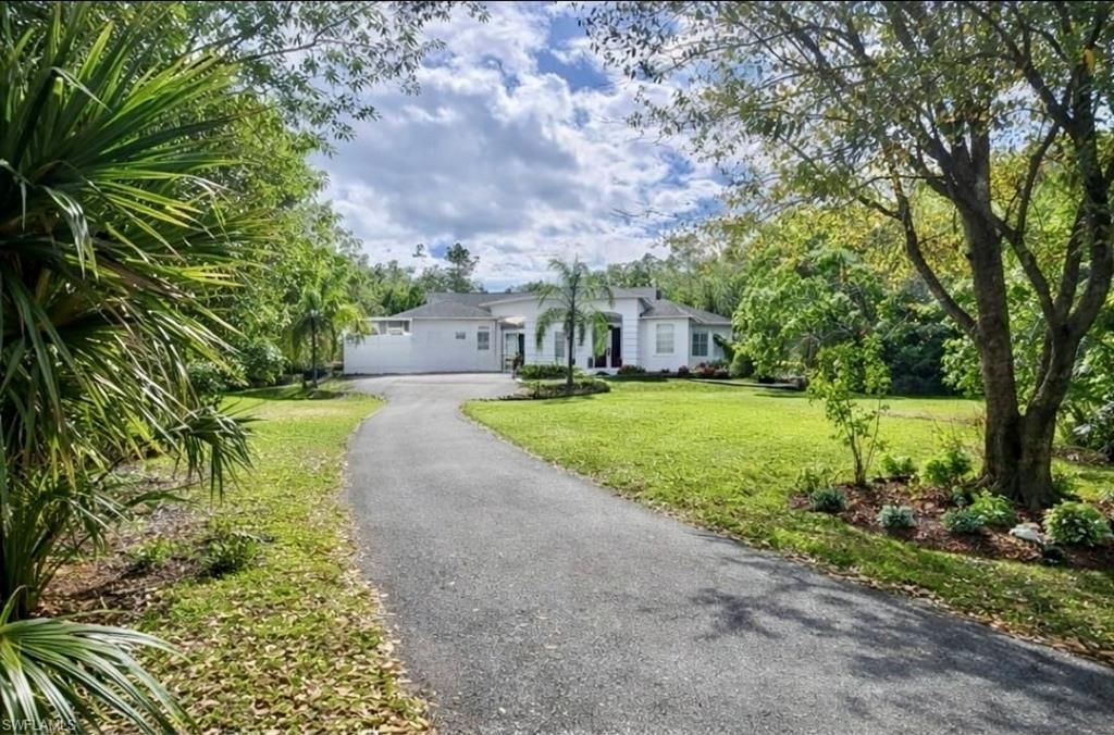 Photo of 4340 Golden Gate BLVD E, NAPLES, FL 34120 (MLS # 226005179)