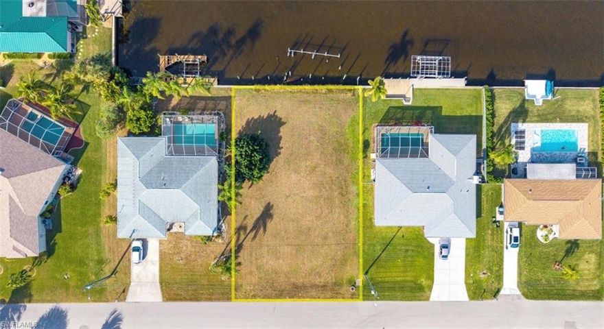 BEAUTIFUL LOT IN THE SWEET SPOT OF SE/SW CAPE CORAL READY TO BUILD YOUR DREAM HOME. OLDER WOODEN DOCK IN PLACE AND YOU WOULD NOT NEED A PERMIT TO UPDATE THE DOCK AND LIFT. COME ENJOY THE NICE QUICK RIGHT OUT TO THE RIVER. DONT MISS OUT.
