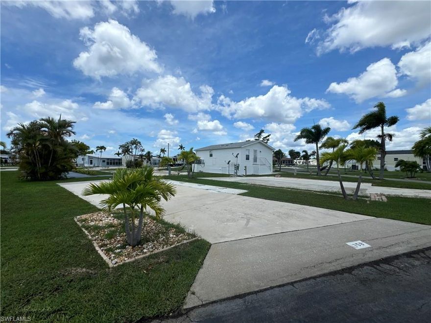Welcome to Palmetto Palms where YOU own the land. Ready for an elevated manufactured home, Ashi Park model, camper, fifth wheel, destination trailer etc. This spacious lot has a large clean slab, new 50/30 AMP RV electric post, and is located on I St., just a short walk from the main hall and main swimming pool. There’s so much to do in just a short stroll to other amenities such as shuffleboard, volleyball, pickleball, tennis, horseshoes, and a number of other park activities,  even a second swimming pool. This lot is located in the non-pet section and golf carts are allowed. Palmetto Palms sustained damage from hurricane Ian, but most of the amenities are up and running, and the main hall is being restored. The community is located just 3 miles from Times Square Fort Myers Beach, and just 1 mile from Bunche Beach on the Gulf of Mexico where you can pick shells, rent kayaks, and watch amazing sunsets over Sanibel Island. Walk to shopping, restaurants, the beach, and more. Welcome to endless summer!