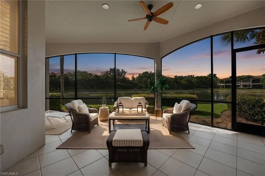 Beautifully updated first-floor end residence offering the ideal blend of privacy, natural light, and seamless indoor outdoor living. Positioned with a private entrance and an extended paver driveway, this home lives with the feel of a single family residence while enjoying the ease of a condominium.

The light filled great room floor plan features volume ceilings, wide plank tile flooring with a wood look finish, and expansive sliders that open to a screened lanai overlooking tranquil water and lush greenery. Multiple exposures enhance natural light throughout, creating a bright and inviting interior.

A custom built-in media wall with integrated lighting anchors the living area, adding both architectural interest and functionality. The neutral palette provides a clean, sophisticated backdrop that complements a wide range of design styles.

The kitchen is well appointed with white cabinetry, stainless steel appliances, generous counter space, and a breakfast bar that connects effortlessly to both the dining area and casual breakfast nook.

The primary suite offers a spacious retreat with dual vanities, soaking tub, and separate shower. Guest bedrooms are thoughtfully positioned for privacy, including a flexible space ideal for a home office.

Outdoor living is a standout with a covered and screened lanai designed for year round enjoyment, perfectly positioned to capture peaceful water views.

Located within Mediterra, residents enjoy a refined community setting known for its mature landscaping, elegant architecture, and world class amenities.