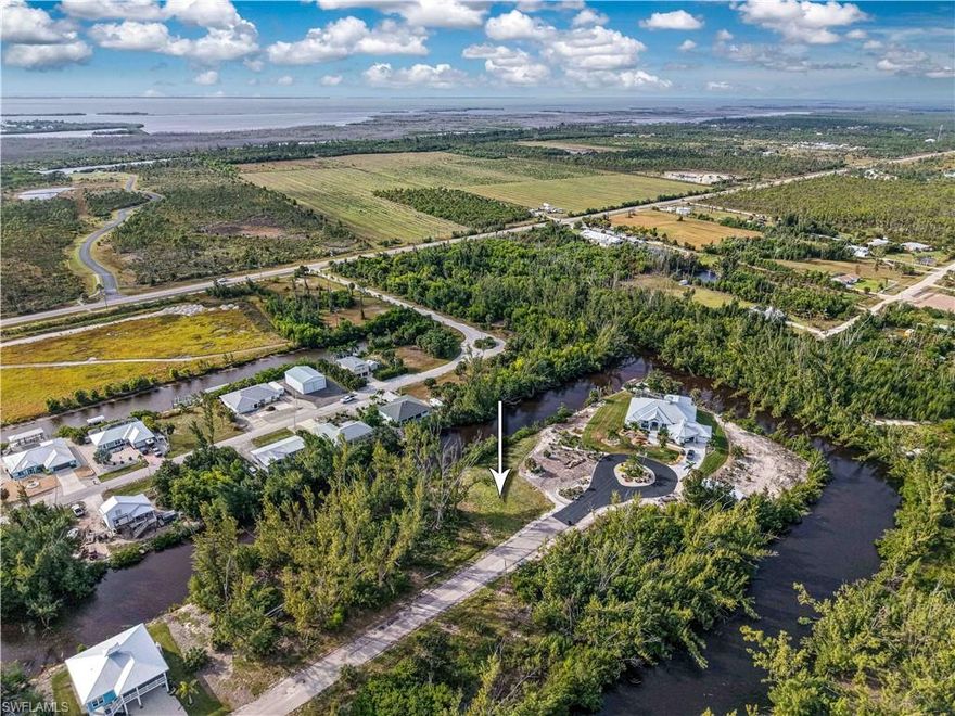 Welcome to your slice of paradise! This 80x100 freshwater canal lot offers the perfect setting to build your dream home in the serene community of St. Jude Harbor. Situated on a peaceful cul-de-sac, this cleared lot features a gentle, sloped bank leading directly to the canal, providing easy access for launching your kayak and enjoying the tranquility of waterfront living. Just a short walk away, the St. Jude Nature Trail invites you to explore the stunning natural surroundings, while a nearby public park with tiki huts and picnic tables provides a relaxing spot to unwind. Whether you’re an outdoor enthusiast or someone looking for a peaceful retreat, this location has it all. With plenty of space to design and create your ideal home, this lot offers a rare opportunity to enjoy the best of Florida living.