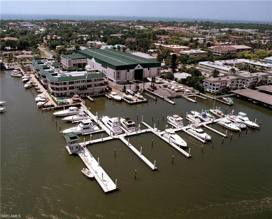 60' x 19' wet slip available at NAPLES BOAT CLUB. Fixed wood dock, metered electric, water, Direct TV, WiFi and laundry facilities. Gorgeous clubhouse with heated swimming pool, full showers, caterers kitchen, conference room, billiards, and TV. Wharf Tavern Restaurant on site, Molly's Marine Service on site, Coastal Marine Fuel on site.  This slip is uniquely positioned within the interior of the marina and with that comes many benefits including close proximity to temporary parking making loading and unloading your boat gear a breeze, shade from the afternoon sun provided by the adjacent condo building, and keep your boat under bottom cleaner by staying out of the Naples Bay current.  Naples Boat Club is a Clean Marina facility. Wet slip owners have possessory use rights and the Association pays the taxes which is included in the maintenance fees. Walking distance to Fifth Avenue shops and restaurants.