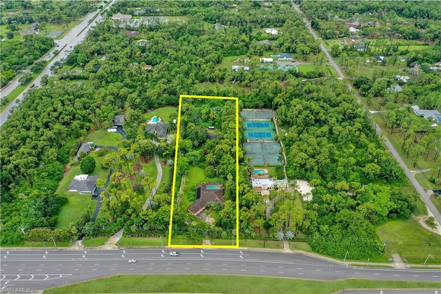 Rare find in Naples! Situated on over 3.5 acres this single family pool home & detached garage has a wonderful private oasis feel and offers a full circular drive that almost covers the entire acreage, large paved driveway leading to a 3-car garage on main house, tropical landscaping from front to rear, and a detached garage/shop w/ under air office space & a full bath. Perfect home for someone desiring Agricultural Exempt status and/or home based business that requires shop & land i.e. trucking, landscaping, construction. The main house offers a classic living & family room layout, spacious kitchen w/ service window to pool lanai & island, formal dining room w/ custom window seat, screened front entry w/ French doors to home, primary suite w/ tray ceiling & guest suite, surround sound system, and an extended screened lanai w/ heated pool, half bath, & long under truss sitting area. The solar system that heats the pool has been refurbished, a new well pump has just been installed, the 2 septic systems are regularly maintained, and the fridge is brand new. Fantastic Naples location-NOT in a flood zone- w/ easy access to I-75 and surrounded by lots of dining/shopping options.