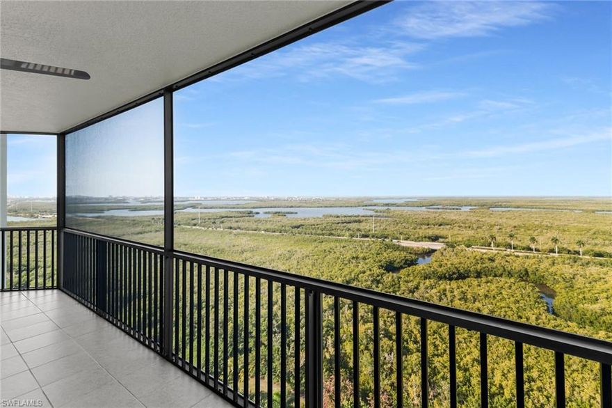 Experience luxury living on the 19th floor with breathtaking panoramic
views of the Gulf of Mexico, Marco Island, peaceful preserves, and
unforgettable sunsets from your private lanai. This exclusive
3-bedroom, 2-bath residence offers peace of mind with impact-resistant
doors and windows and showcases stunning flooring throughout. The chef’s kitchen is thoughtfully designed with stainless steel appliances and opens seamlessly to the spacious great room—perfect for
entertaining while watching the sun melt into the Gulf. Serene coastal
colors, modern lighting, and stylish ceiling fans enhance the
contemporary feel, while expansive windows frame mesmerizing water,
island, preserve, and sunset views.

The primary suite features a spa-like bath with a gigantic soaking
tub, creating a tranquil retreat. Residents enjoy first-class
amenities conveniently located within the building, including a pool,
theater room, state-of-the-art fitness center, social room with
billiards, and elegant gathering spaces such as the gorgeous lobby and
well-appointed mail room. The community also offers a tiki bar at the
main clubhouse, ideal for relaxed island-style gatherings. Ideally located between Marco Island and downtown Naples’ 5th Avenue, this home is just minutes from world-class dining, shopping, and
pristine beaches. Elevated coastal living with spectacular sunsets and
serene preserve views—schedule your private showing today.