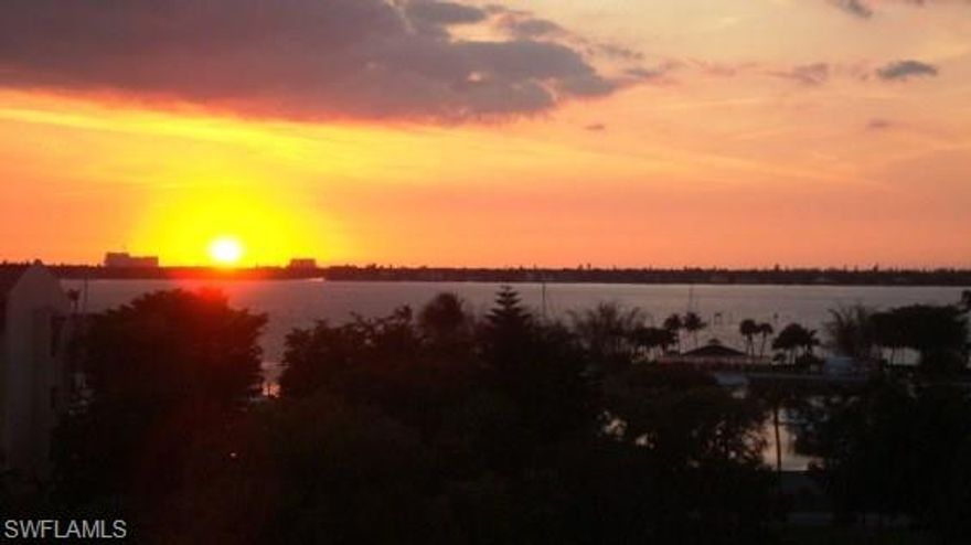 LIVE WHERE YOU PLAY! in the best kept secret of Fort Myers:  The Landings Yacht Golf and Tennis Club.  Enjoy watching boats cruise up and down the Intracoastal Waterway from your lovely screened lanai.  The sunsets over the river are glorious! This 2 bedroom, 2 bath condo feels much more like a home with the huge closets, and ample living space.  The building offers 3 Guest Suites for your family and friends to use with a reservation. (nominal cleaning fee)   TENNIS players LOVE the Ariel building with its 3 private Clay courts.  The Landings Tennis program is very popular and busy, but you can always play at your Ariel home court.  Tennis, Golf, and a boat slip (upon availability of boat size) is included in the $380. per month club dues! Also included is a 24/7 guarded gate with roaming security, use of 2 beautiful dining venues INSIDE the gates!  Walk to dinner at the riverside bistro with a sunset view!  Condo fee includes the AIR CONDITIONING!  Buyers have discovered the great value of living at Ariel.  There is not much inventory now, don't wait!  Tenant occupied.  $1,450. month until December 1, then $3,500. per month Jan, Feb. and March. Owner is licensed Realtor in Vermont