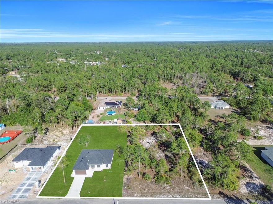 NEW CONSTRUCTION • HALF-ACRE INCLUDED • OPTION FOR FULL ACRE • NO HOA Rare opportunity to own a new construction home on a 0.50-acre lot, with the adjacent lot available (same owner) for the right price, creating a potential full-acre property. Features 3 bedrooms + DEN, 2 bathrooms, high ceilings, impact windows, quartz countertops, stainless steel appliances, and porcelain tile throughout. Located on a quiet dead-end street with plenty of space for a pool, RV, or outdoor living. Seller willing to install fence and consider concessions with the right offer. Unique flexibility rarely available in this area. Easy to show.