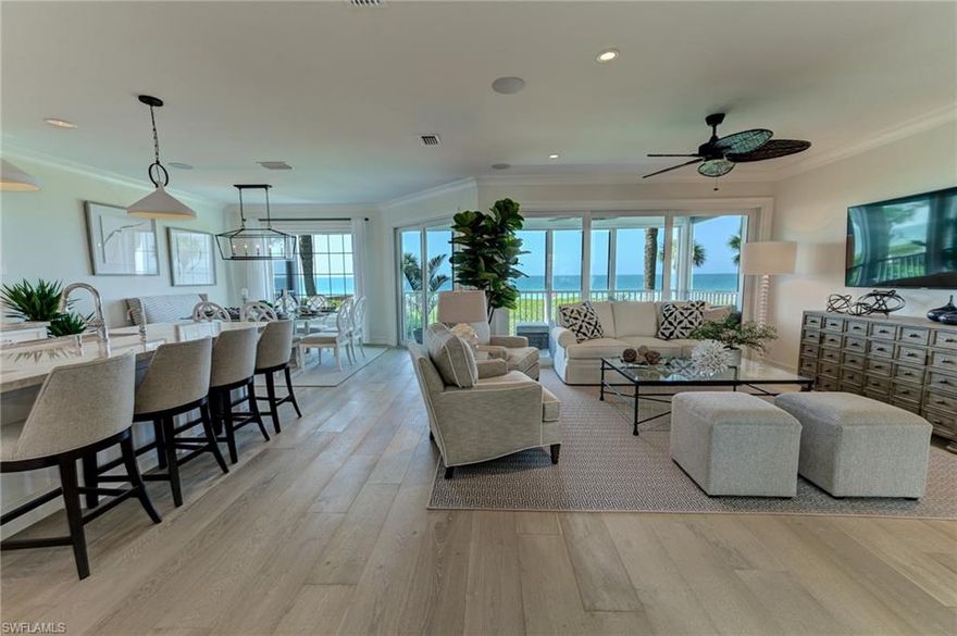 Rarely available direct beach front home. 1 of only 9 beach front villas. This 3-story property has just been completed. This home offers a total reimagining with a modern 2019 layout that offers 4 bedrooms and 4.5 baths. This home offers top to bottom tasteful elegance and high end materials and has been professionally designed and furnished. The main level offers open coastal living with large kitchen island with quartz tops and viking appliances along with custom cabinetry. Luxury features include one touch lighting and in wall touch screen control of whole house Sonos audio. Three luxury guest suites with en suite full baths including one that is beach front. The beach front master suite is stunning with soaring ceilings  and nickel gap accent wall. The master bath is stunning and generously sized with his and her vanities, glass shower, soaking tub. Additionally this home offers 3 car garage, hurricane lanai shutters, and impact glass. The villas at Barefoot Beach offer maintenance free living, two pools, and 24 hour patrolled security.