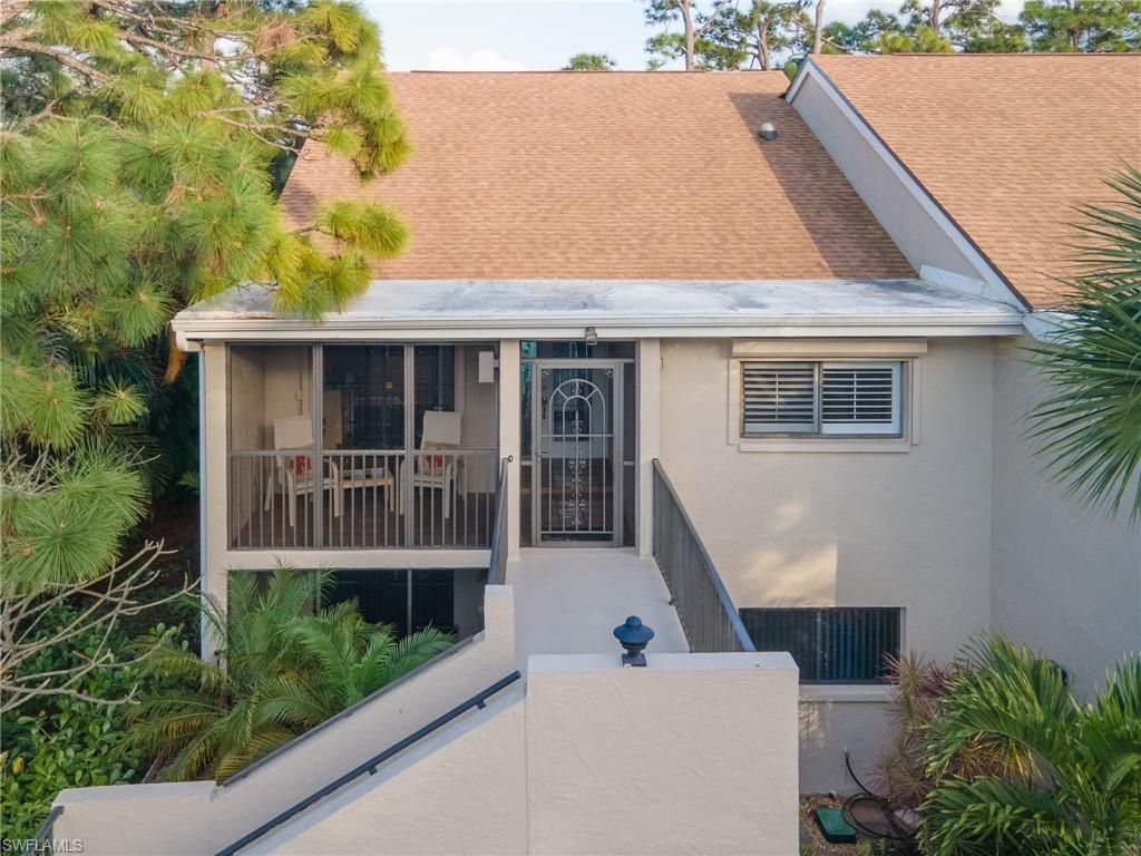 Photo of 15470 Cedarwood LN #201, NAPLES, FL 34110 (MLS # 226008285)