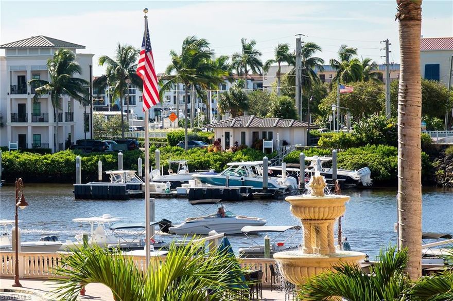 Experience the unrivaled lifestyle of Bayfront from this spectacular residence offering gorgeous bay views, multiple outdoor entertaining areas and a host of modern updates. Exceptional floor plan, with luxury wood vinyl, updated plumbing fixtures and mechanicals. Crisp white kitchen, with new stainless steel appliance package, quartz countertops and glass subway backsplash. Sizable primary suite with walk-in closet, outdoor patio and updated bath. Large den with banks of windows opening up to Naples Bay, features a pull out sofa & closet space; perfect for overnight guests.  Easy access to garage parking.  Bayfront Place offers incredible amenities, including a lap and separate leisure pool, gym, tennis and pickleball courts. An easy distance to Tin City, Fifth Avenue South and the white sandy beaches of the Gulf of Mexico.