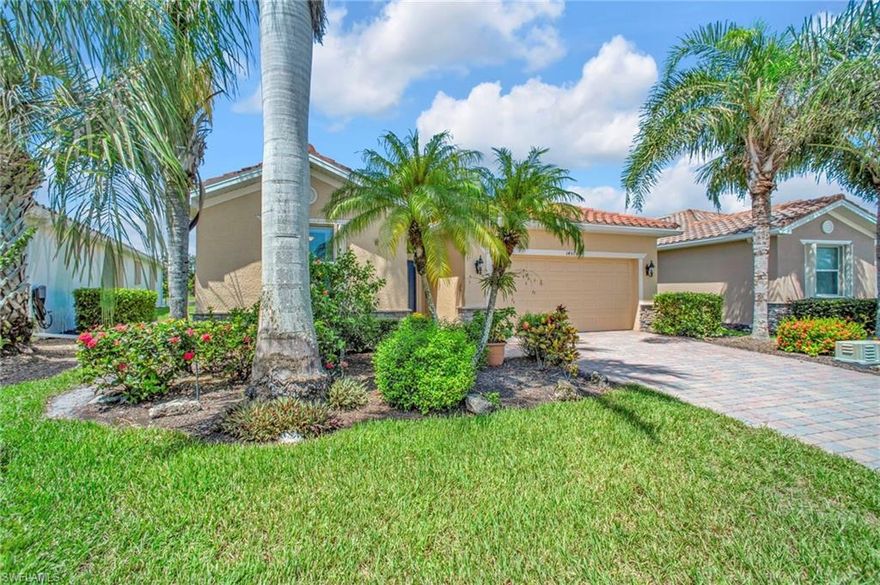 2026 Special assessment for the pond bank remediation will be covered by the seller (3175.00) This home offers the ideal blend of comfort, convenience, and resort-style living in Naples. Built in 2014, this 3 bedroom, 3 bath with a den offers a desirable split floorplan, 2 car garage, and a pond view from the screened lanai. Located in the sought-after gated community, Reflection Lakes of Naples, which offers low HOA fees, and no CDD. The open design features tile flooring throughout and numerous updates, including a kitchen backsplash, crown molding, fresh paint, garage fan with temperature control, new HVAC (2023), new microwave (2024), new dishwasher (2025). Additional blown in insulation in all attic spaces and pest control maintenance in place.  The master suite includes a luxurious bath with a soaking tub, separate shower, and double sink vanity. One guest bedroom features its own ensuite, while the den comes with a built in desk area, and double twin Murphy bed system-perfect for extra guests. Additional highlights include, storm protection including hurricane bracing on garage door, and loft storage in garage in addition to attic storage. Great rental potential with 30 day minimum 3 times a year. Community amenities include a resort style pool, kiddie pool, clubhouse, fitness center, library, bocce ball court, and a vibrant social calendar. Pet friendly too! Perfectly located near Marco Island and 5th Avenue in Naples, with dining, grocery stores and shopping close by. Move in ready.