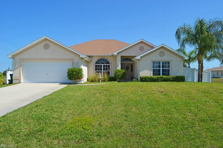 Large home with 4 bedrooms and over 2,300 SF.  Great for a growing family! Home features a large great room, formal dining room, master suite with walk-in closet, tile on a diagonal in the living area, indoor laundry, large kitchen with SS appliances, breakfast bar, solid surface countertops, pantry, gorgeous backsplash, auto sprinkler system for a beautiful yard, plenty of room for a pool in the large fenced yard.  This home is in move-in condition and ready for its proud new owners!