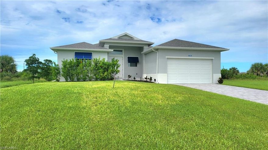 Take advantage of the newest building codes and high elevation!  BRAND NEW WATERFRONT MOVE-IN READY 4 BEDROOM HOME!! Certificate of Occupancy already in place!! $50,000 OF UPGRADES INCLUDED! BEST PRICED HOME IN CAPE CORAL WITH THIS MANY UPGRADES! 13+ FOOT VAULTED CEILINGS! **BRICK PAVER DRIVE + WALKWAY! 100% UPGRADED WOOD-LIKE TILE FLOORS THROUGHOUT! **AUTOMATIC SPRINKLER SYSTEM! **UPGRADED SOD! **GIGANTIC WALK-IN SHOWER **OVERSIZE LAUNDRY/UTILITY ROOM! **SOFT CLOSE SYSTEM ON ALL CABINET DOORS! **DECORATIVE BERMUDA SHUTTERS IN FRONT** A MUST SEE!!!!!!!!! This move-in ready home in Cape Coral presents an exceptional opportunity for prospective buyers. Want a deal? This is priced $50,000 less than comparable homes. This property offers outstanding value in today's market. With a generous 1900+ square feet of open living space and a 2-car garage, this home is designed to accommodate the needs of almost any size family. As you approach the home, the brick-paver driveway and walkway create a welcoming entrance, complemented by the towering entryway and meticulous landscaping. Inside, the attention to detail is evident, with tall ceilings, wide baseboards, and lots of natural light adding a touch of sophistication to every room. The wood-like tile floors provide durability and style, offering a seamless flow throughout the living spaces. The kitchen is a chef's delight, featuring white raised panel cabinets with slow-close doors and drawers, a large island with a stainless sink, and a full 4-piece upgraded stainless-steel appliance package. The split-bedroom layout provides privacy for the occupants, with the master bedroom serving as a luxurious retreat. Luxurious bathroom with an enormous closet and a beautifully appointed master bathroom with dual sinks and a frameless glass shower wall add to the appeal of the space. In summary, this meticulously designed and upgraded home offers luxury living at an unbeatable price. With its quiet location, desirable features, and significant price, it represents a rare opportunity for buyers looking to own a piece of paradise in Cape Coral. Some photos of the furniture in this listing have been virtually rendered.